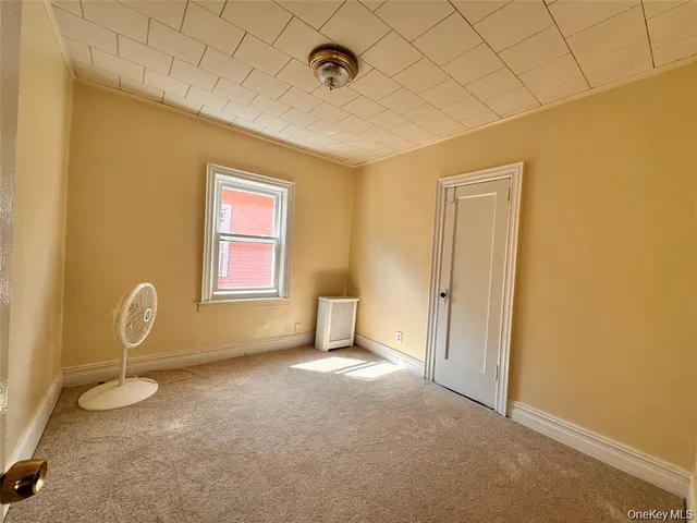 a view of a livingroom with a window