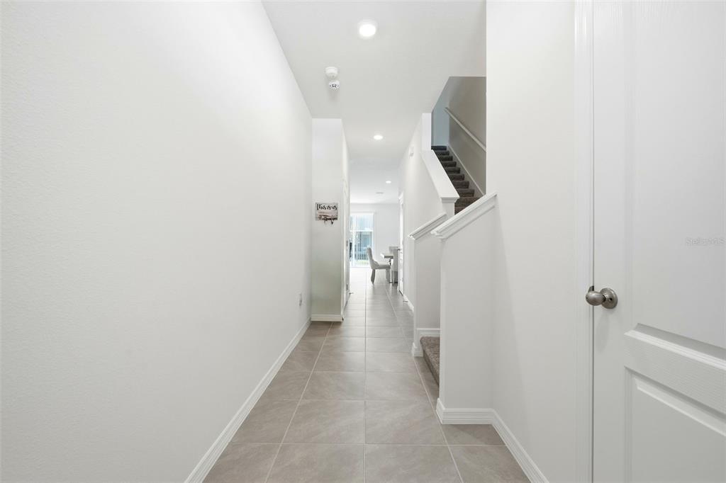 1503 Isleta Loop Kissimmee, FL 34741 - Photo 15 of 50 a view of hallway with stairs