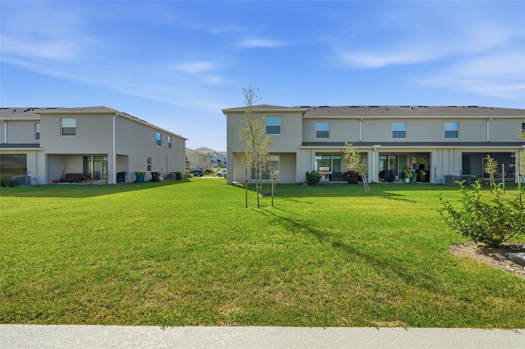1503 Isleta Loop Kissimmee, FL 34741 - Photo 36 of 50 a view of house with yard