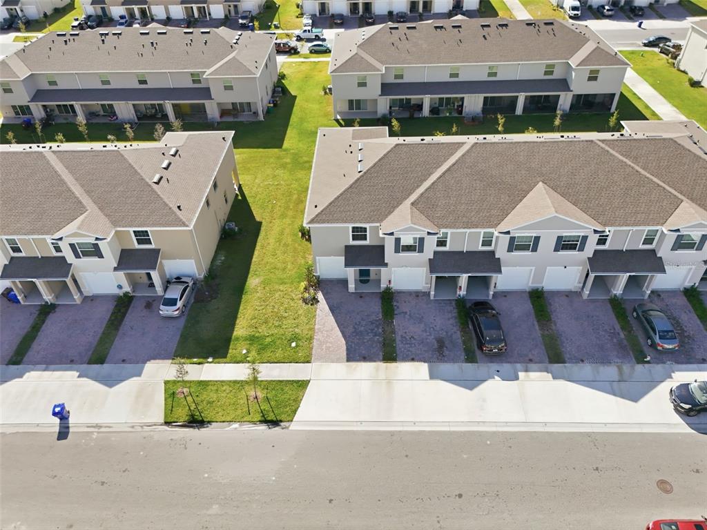 1503 Isleta Loop Kissimmee, FL 34741 - Photo 41 of 50 a aerial view of a house with a swimming pool