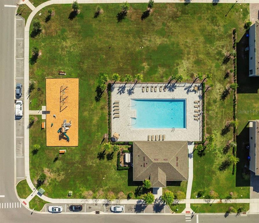 1503 Isleta Loop Kissimmee, FL 34741 - Photo 42 of 50 an aerial view of a house with a swimming pool