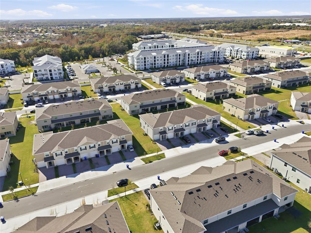 1503 Isleta Loop Kissimmee, FL 34741 - Photo 44 of 50 an aerial view of a city with big lake view