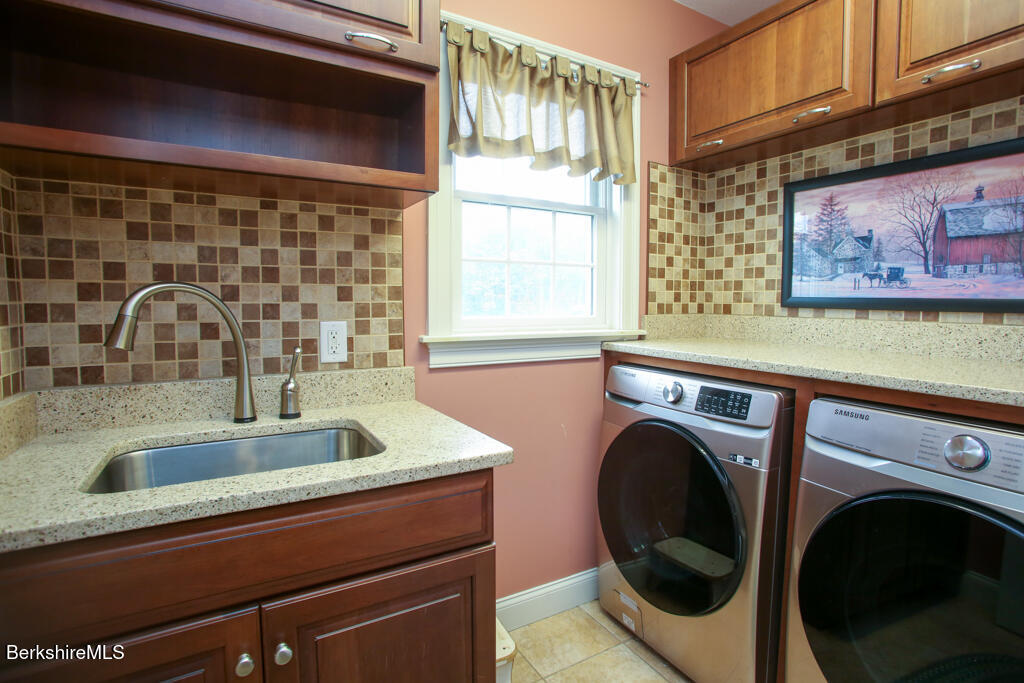 200 Easthampton Road Westhampton, MA 01027 - Photo 11 of 69 a view of a sink and washer and dryer