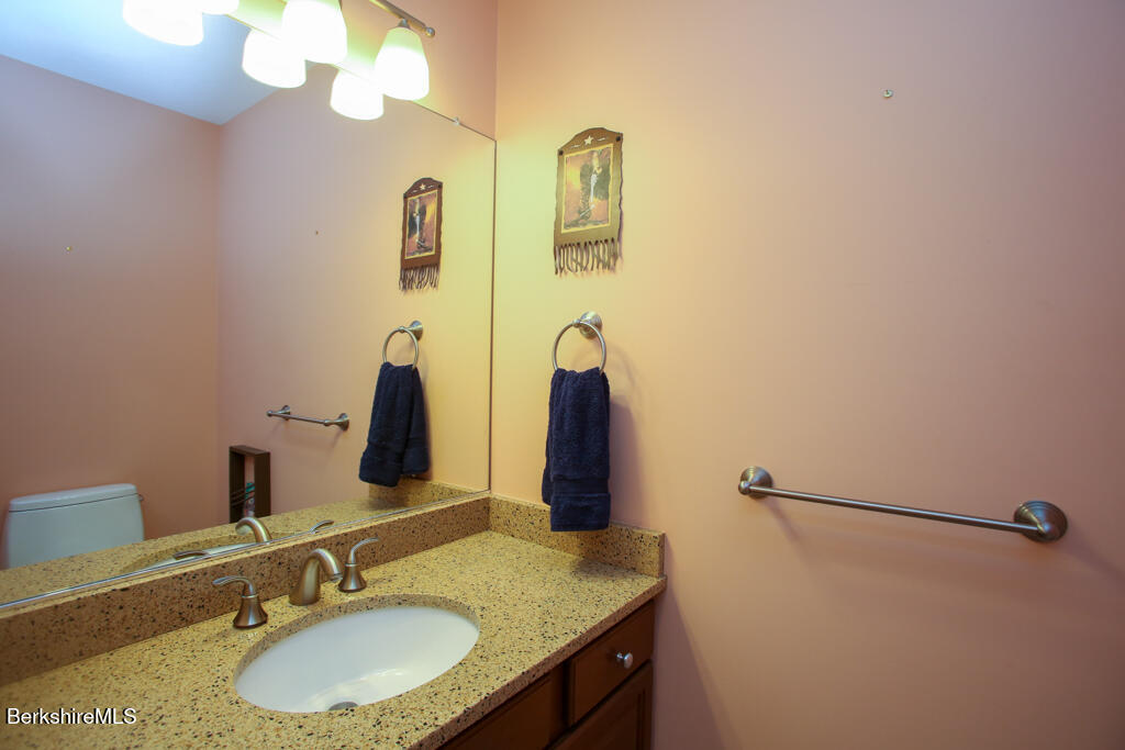 200 Easthampton Road Westhampton, MA 01027 - Photo 12 of 69 a bathroom with a sink and a mirror