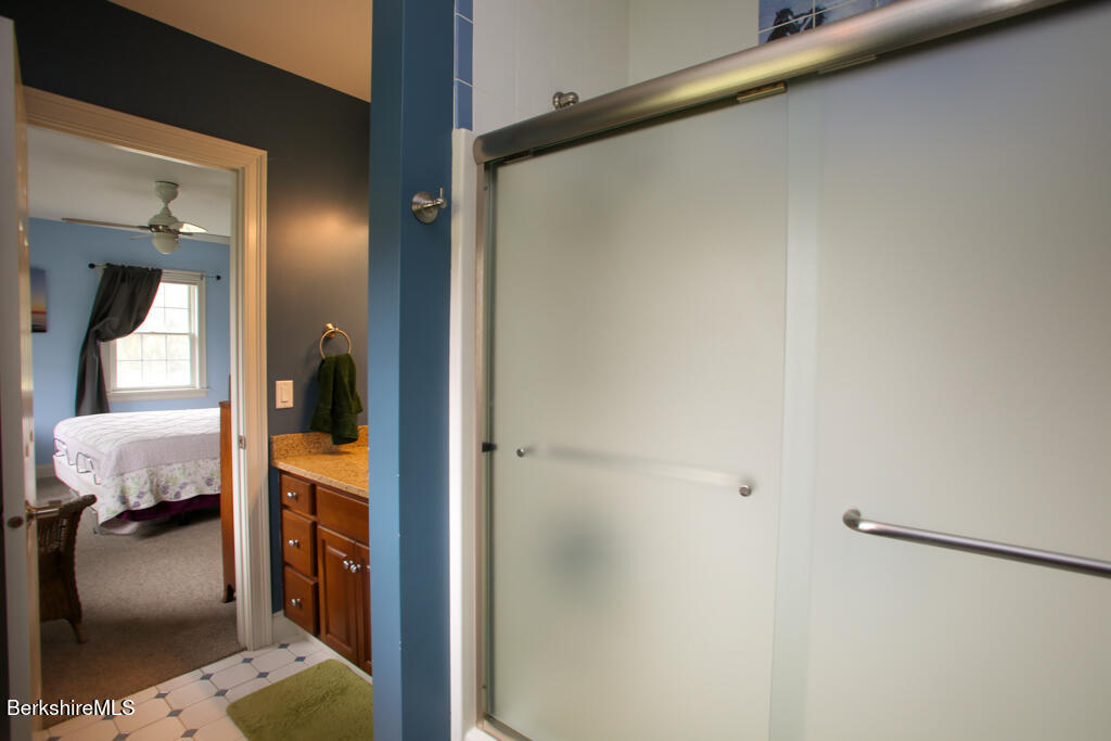 200 Easthampton Road Westhampton, MA 01027 - Photo 20 of 69 a en suite bathroom with a sink and mirror