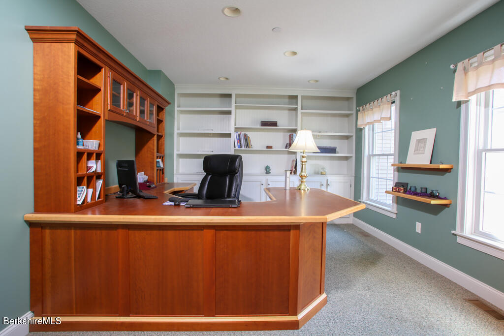 200 Easthampton Road Westhampton, MA 01027 - Photo 21 of 69 a kitchen with kitchen island a sink and a stove top oven