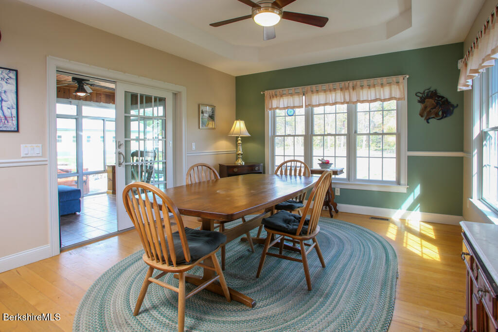 200 Easthampton Road Westhampton, MA 01027 - Photo 23 of 69 a view of a dining room with furniture wooden floor and chandelier