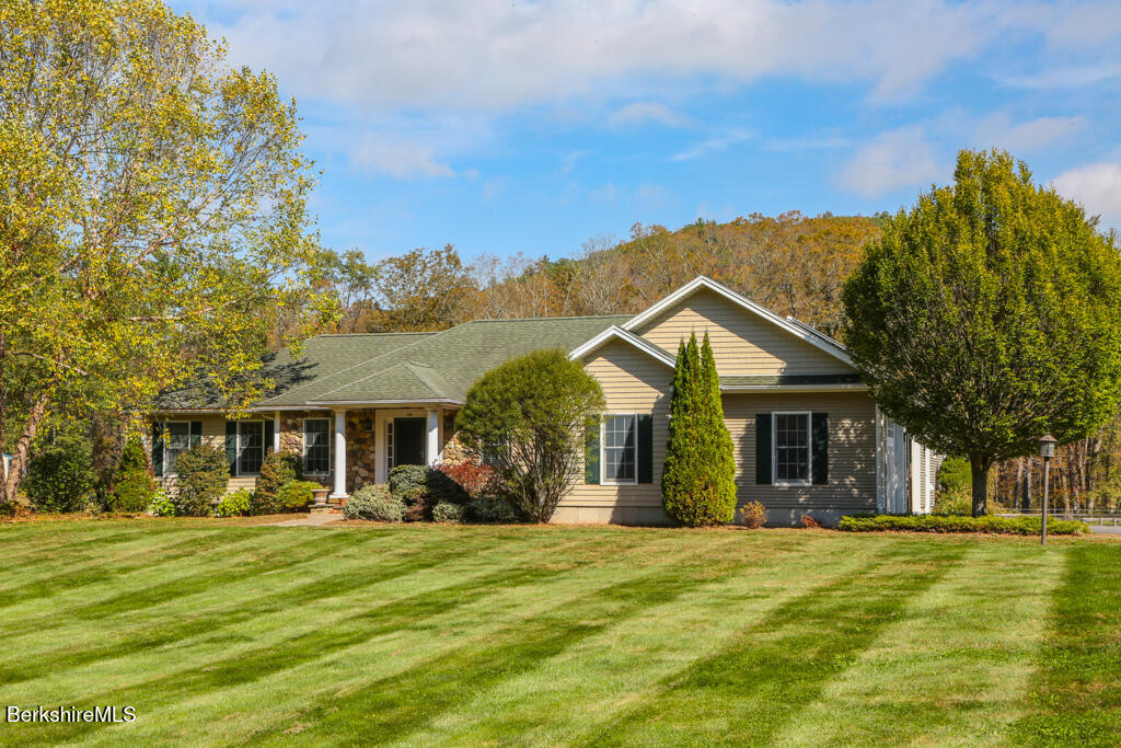 200 Easthampton Road Westhampton, MA 01027 - Photo 5 of 69 a view of a house with a swimming pool