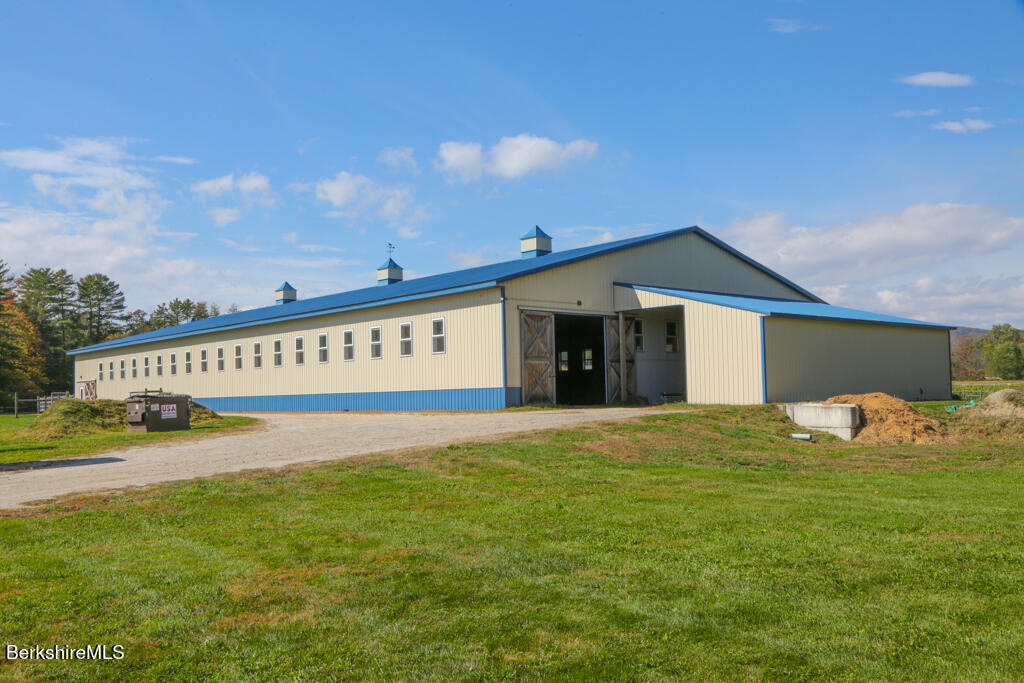 200 Easthampton Road Westhampton, MA 01027 - Photo 52 of 69 a view of a house with a yard and garage