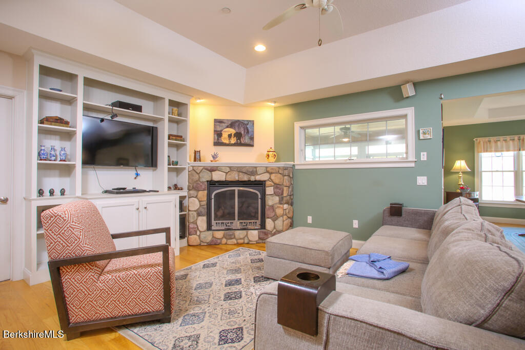 200 Easthampton Road Westhampton, MA 01027 - Photo 10 of 69 a living room with furniture and a flat screen tv