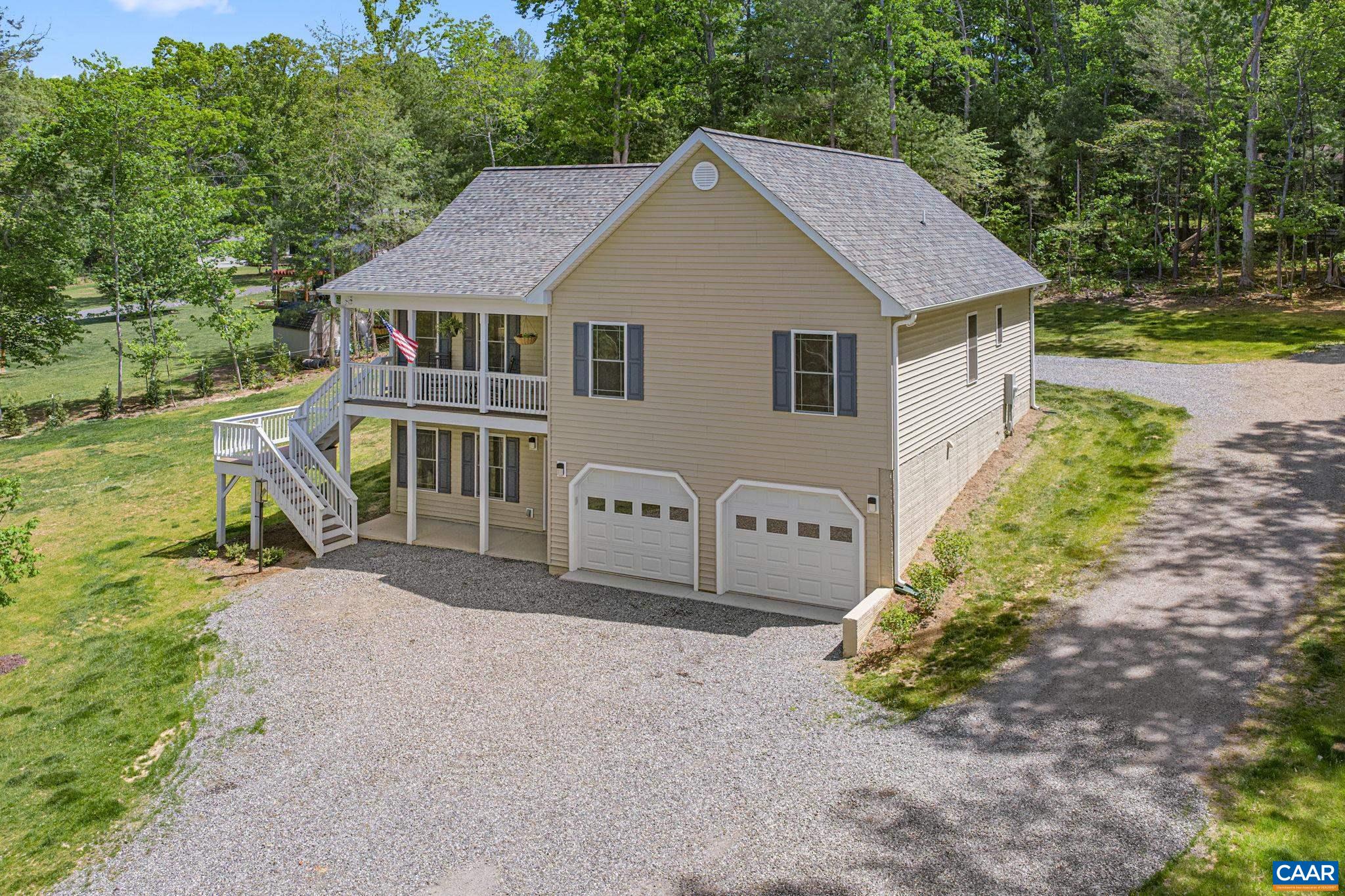 230 Fox Hollow Road Ruckersville, VA 22968 - Photo 42 of 42 a view of a house with backyard and garden