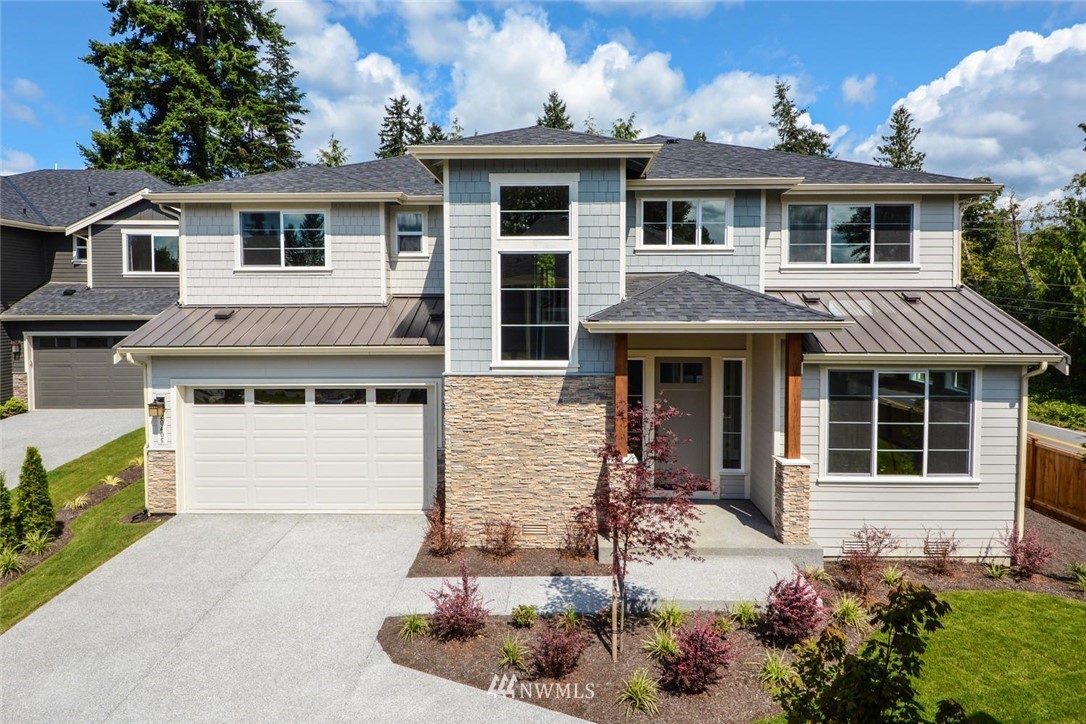20405 4th Drive Southeast Bothell, WA 98012 - Photo 1 of 31 a front view of a house with a yard
