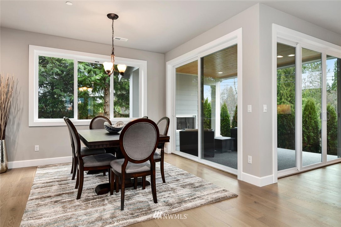 20405 4th Drive Southeast Bothell, WA 98012 - Photo 17 of 31 a view of a dining room with furniture window and wooden floor