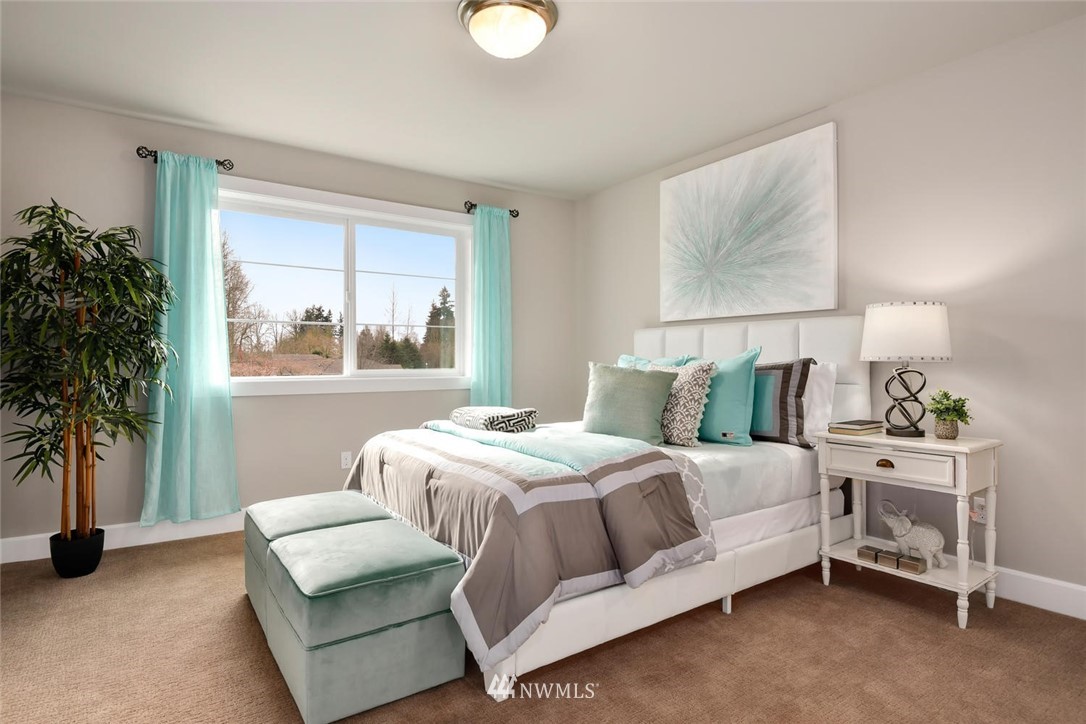 20405 4th Drive Southeast Bothell, WA 98012 - Photo 19 of 31 a bedroom with a bed and a potted plant