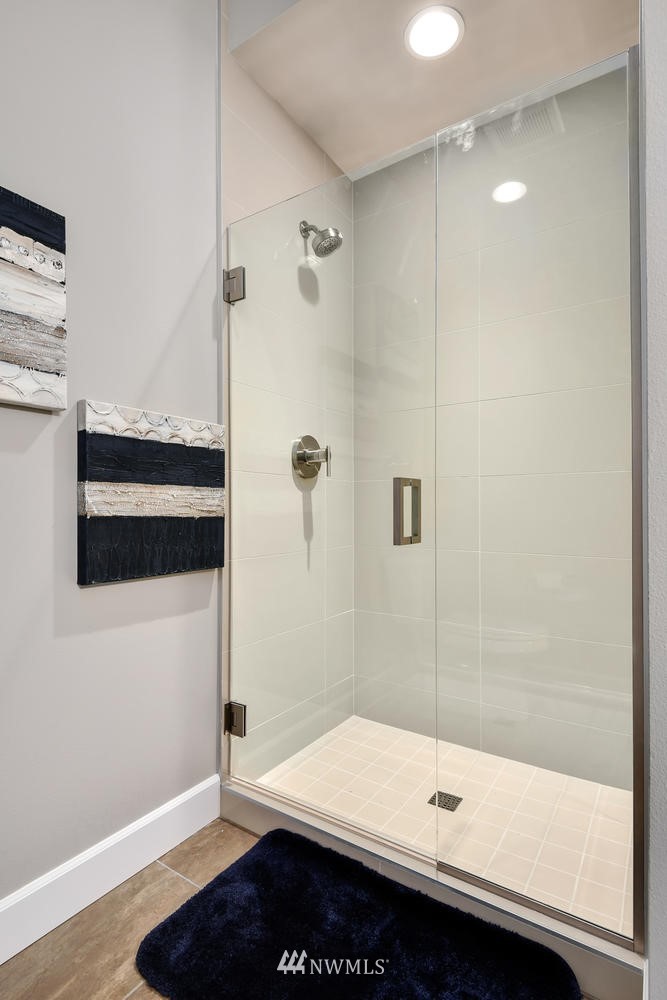 20405 4th Drive Southeast Bothell, WA 98012 - Photo 6 of 31 a bathroom with a bathtub and a shower