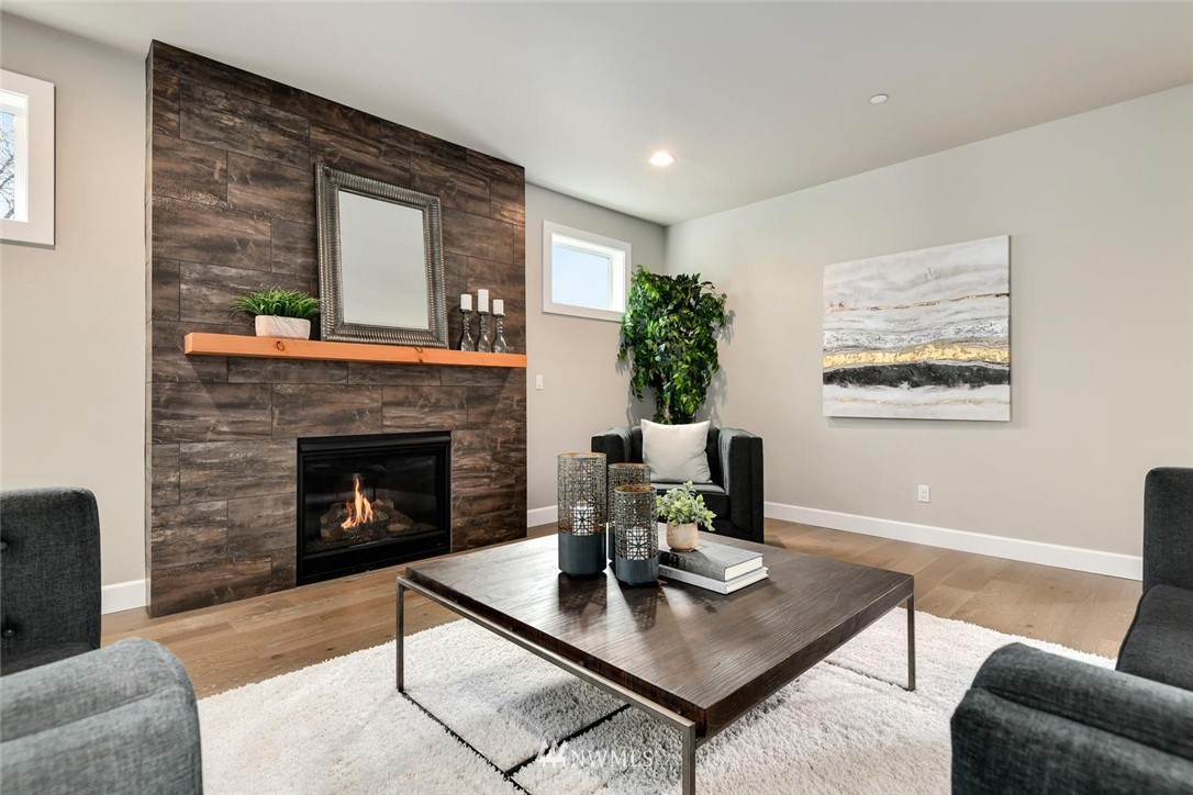 20405 4th Drive Southeast Bothell, WA 98012 - Photo 10 of 31 a living room with furniture and a fireplace