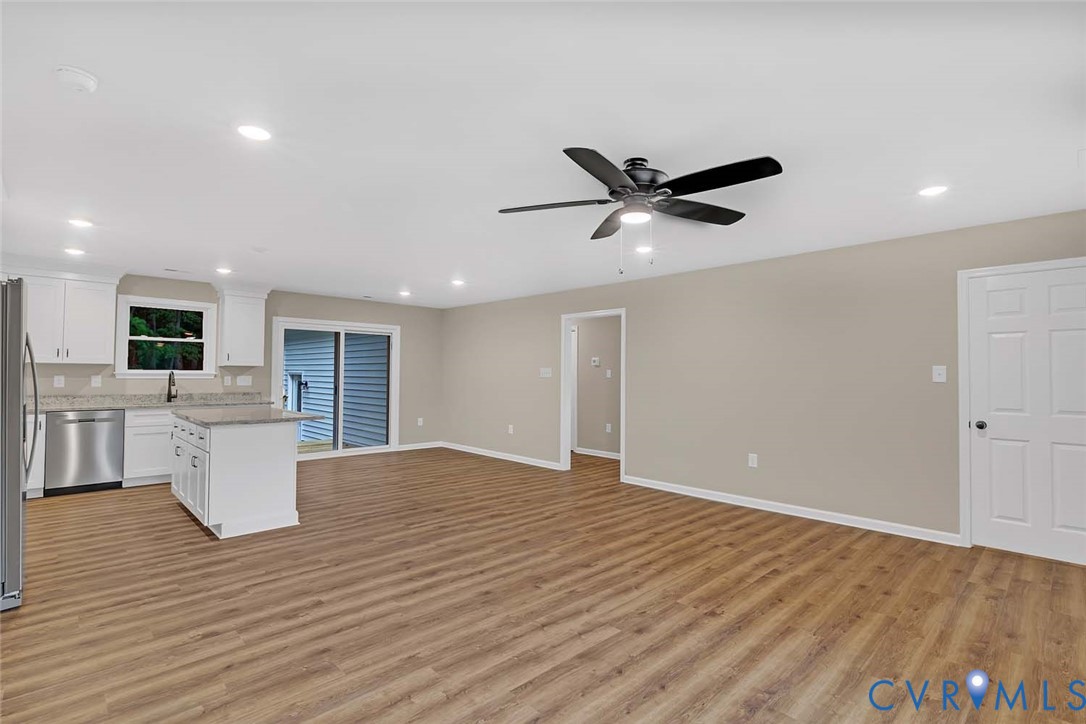 5008 Chestnut Fork Road Gloucester, VA 23061 - Photo 11 of 35 a view of livingroom and kitchen with sink