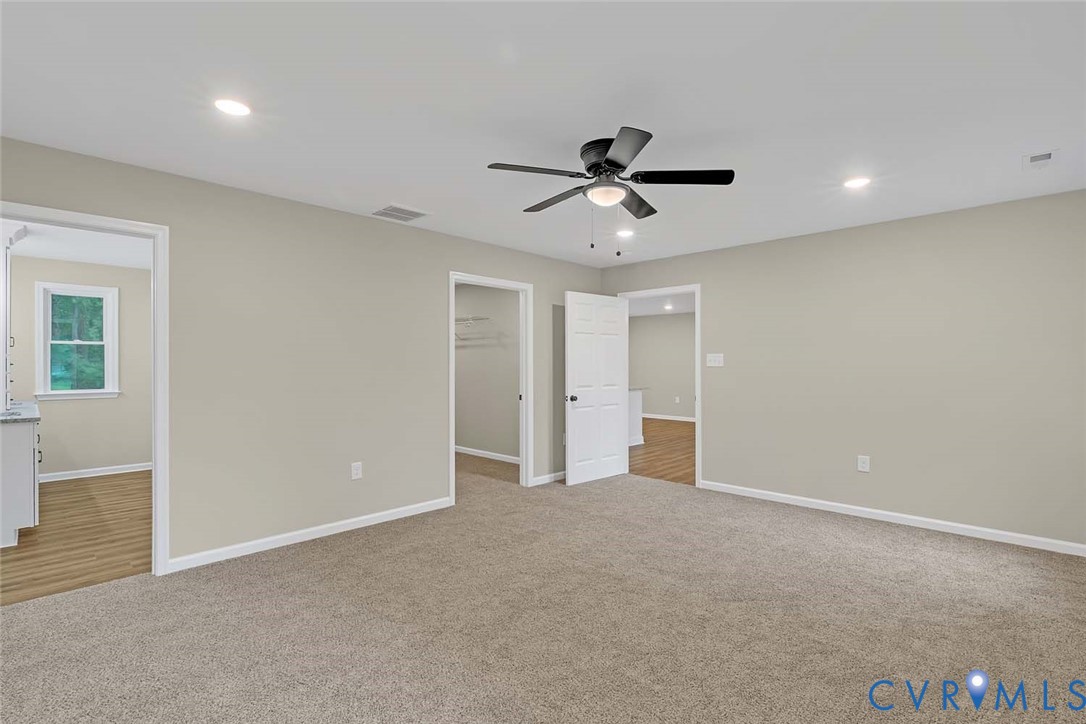 5008 Chestnut Fork Road Gloucester, VA 23061 - Photo 15 of 35 a view of room with a ceiling fan and window