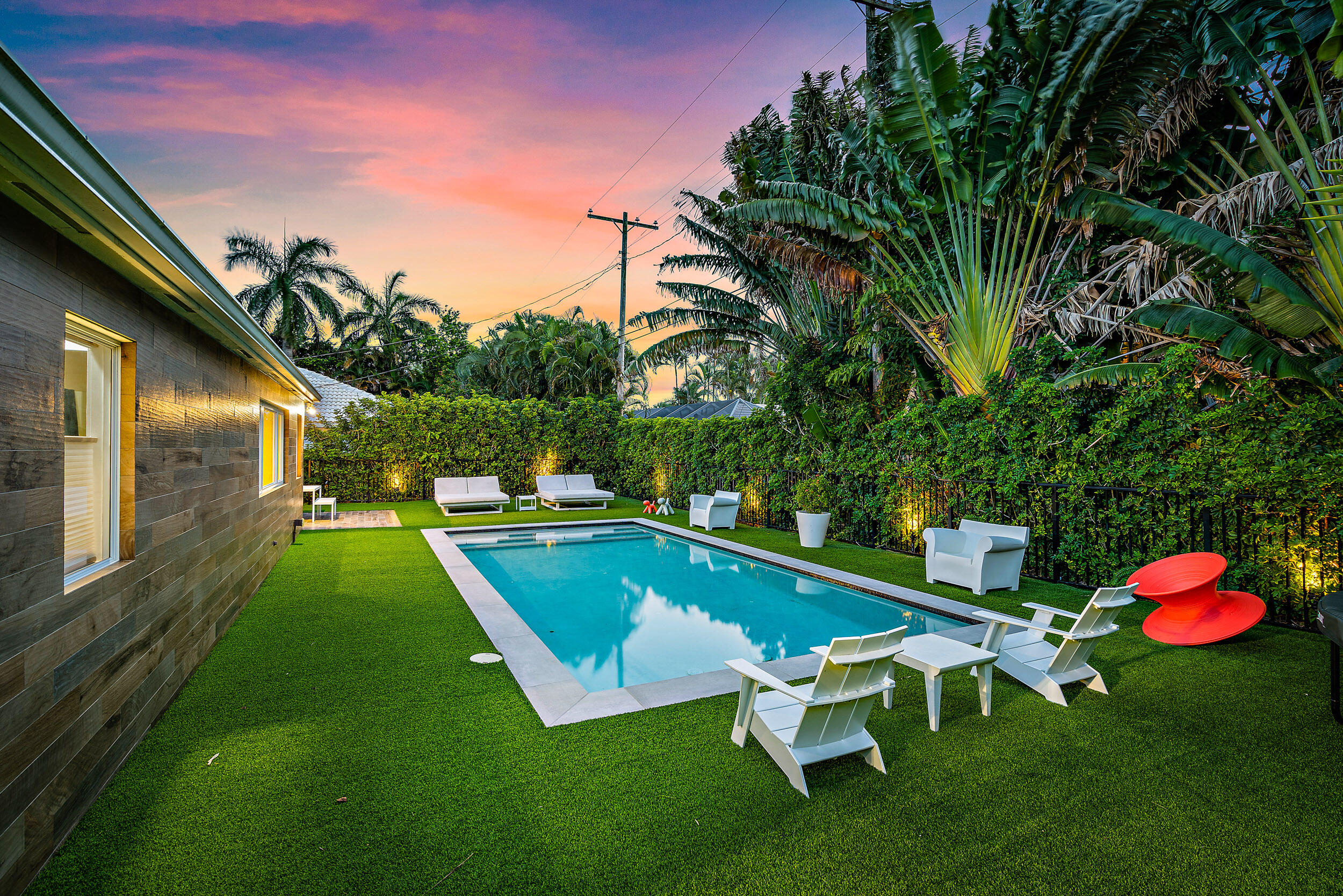 905 Elderberry Way Boca Raton, FL 33486 - Photo 8 of 39 POOL + LAWN AT TWILIGHT