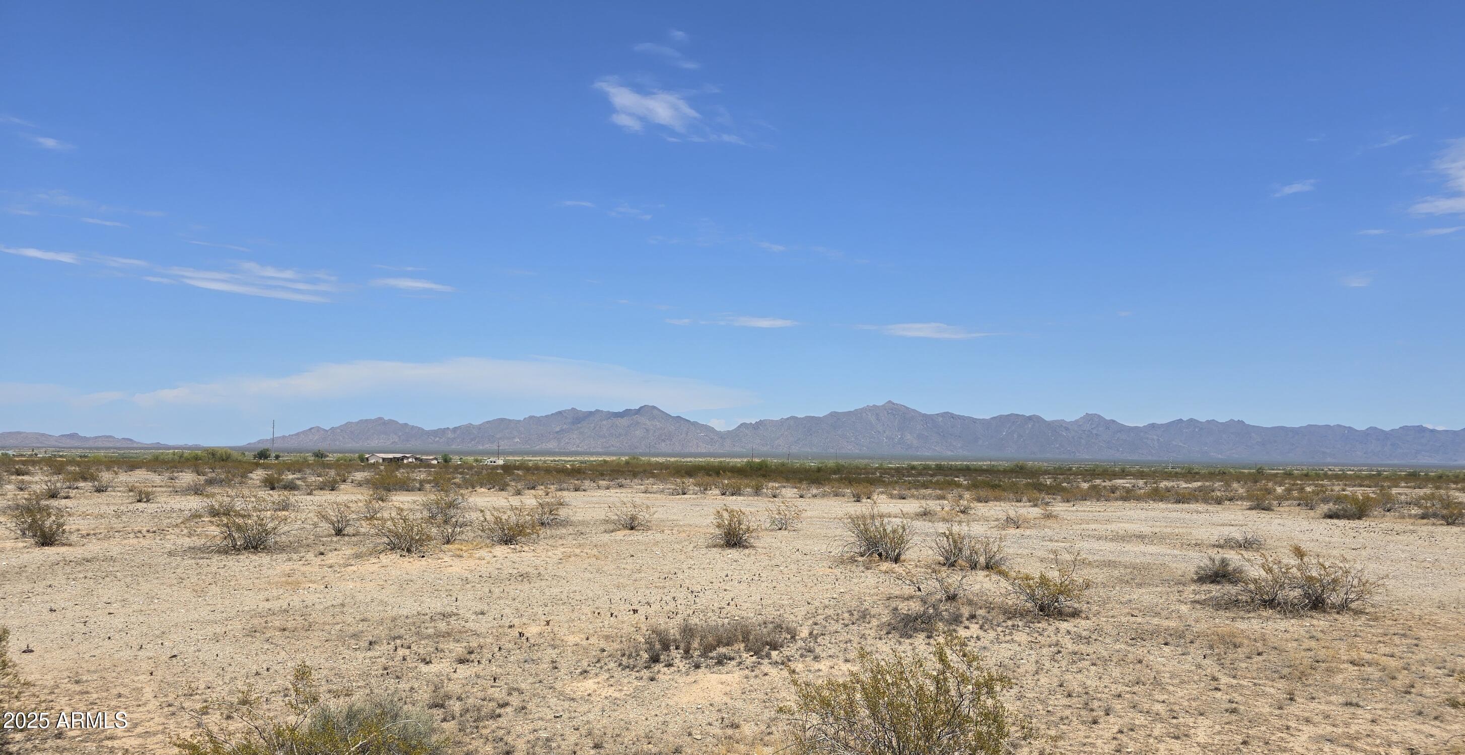 18349 West Mewes Road Buckeye, AZ 85326 - Photo 12 of 14 a view of lake and mountain