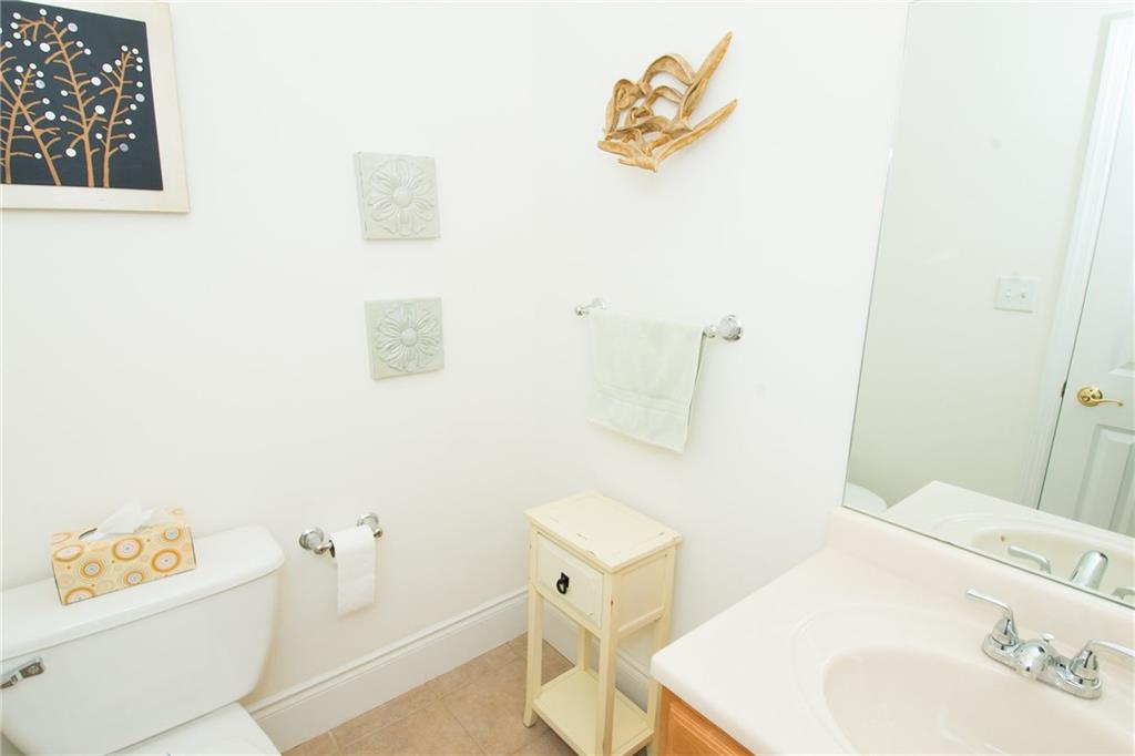 190 Warren Road Warrendale, PA 15086 - Photo 11 of 25 Bright and cheery half bath is located off the entry way in the hallway leading to the kitchen.