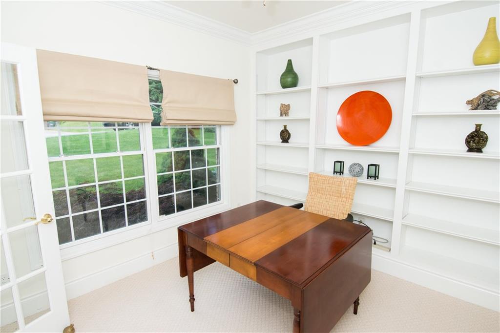 190 Warren Road Warrendale, PA 15086 - Photo 12 of 25 The office/den/study/library is located on the main floor right off the entry. It features a french door and built in bookcases.