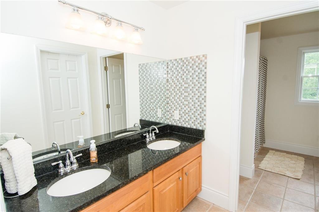 190 Warren Road Warrendale, PA 15086 - Photo 15 of 25 The master bath offers double sinks with new granite tops and new back splash and abundant under sink storage. This space is separate from the shower and commode area which offers a welcome bit of privacy for each person.