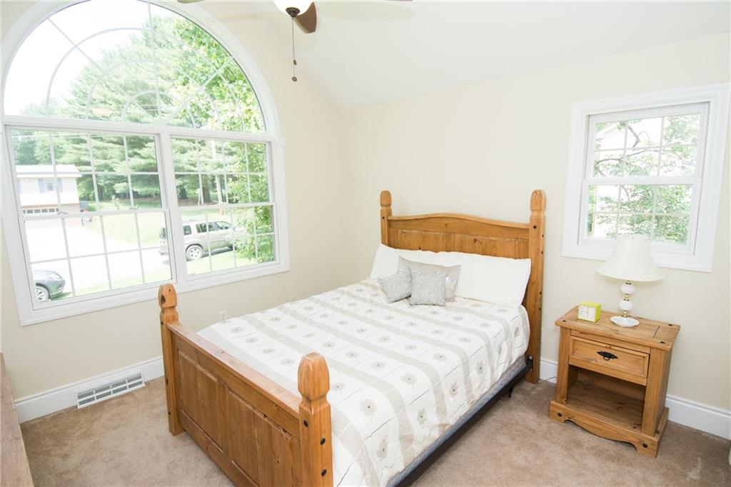 190 Warren Road Warrendale, PA 15086 - Photo 19 of 25 The last of the three additional bedrooms is located in the front of the house and is enhanced by the expansive palladian style window. It is very roomy and can accommodate a queen sized bed with plenty of room to spare.