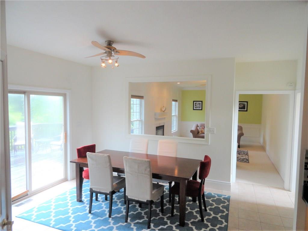 190 Warren Road Warrendale, PA 15086 - Photo 6 of 25 Another view from the expansive kitchen showing the wide doorway and cut out "window" that gives the cook, guests and family the ability to mingle with everyone between kitchen and family room. This gives the home a unique feature and sets it apart from the ordinary yet maintains the open concept feel.