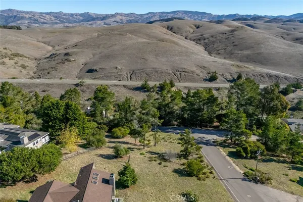 an aerial view of mountain with beach
