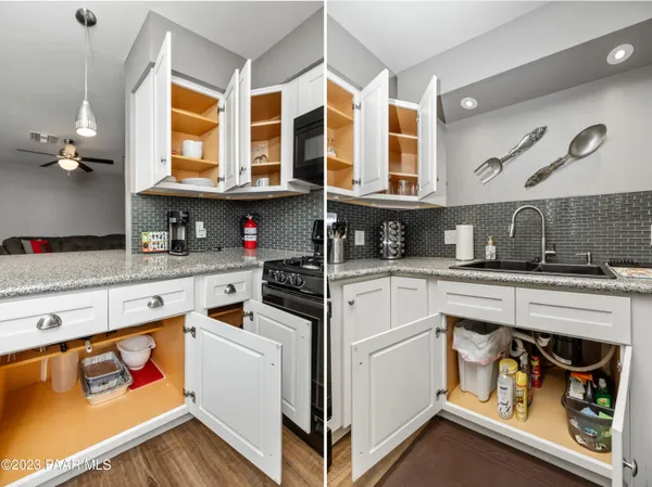 a kitchen with stainless steel appliances granite countertop a stove and a sink