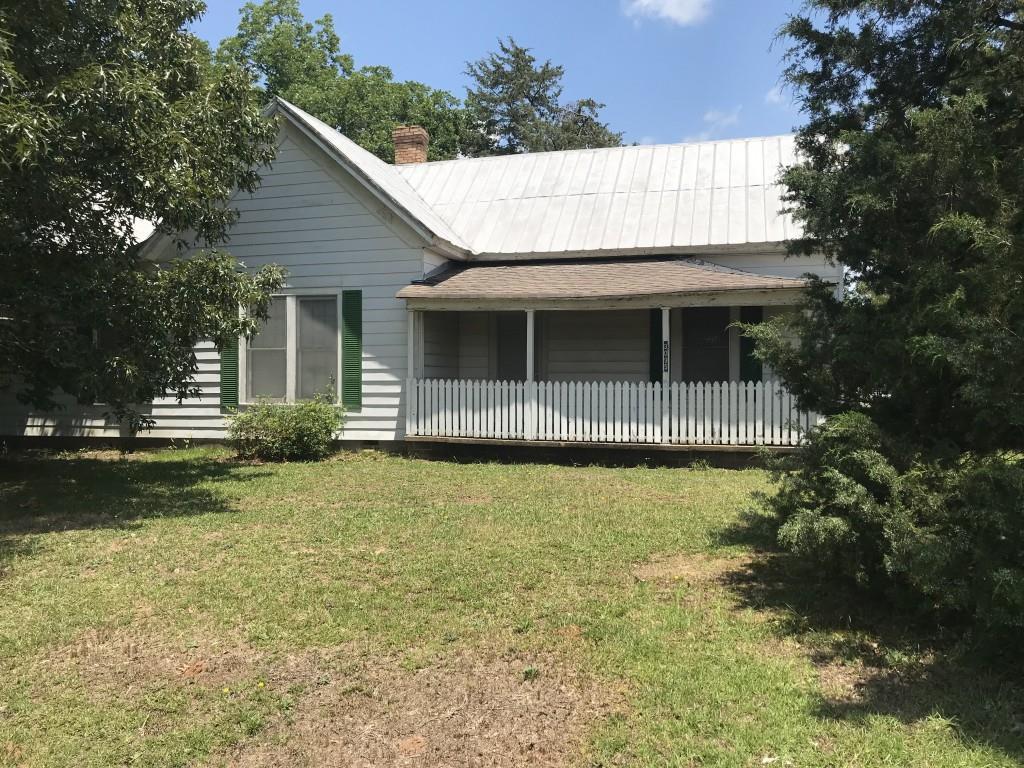 3095 Tig Knight Road Loganville, GA 30052 - Photo 1 of 1 a front view of a house with garden