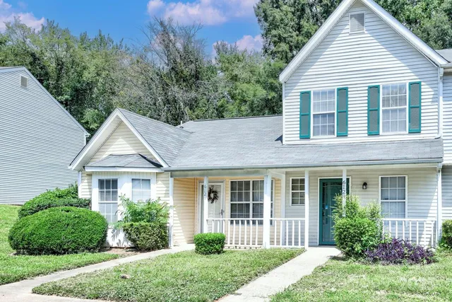 front view of a house and a yard