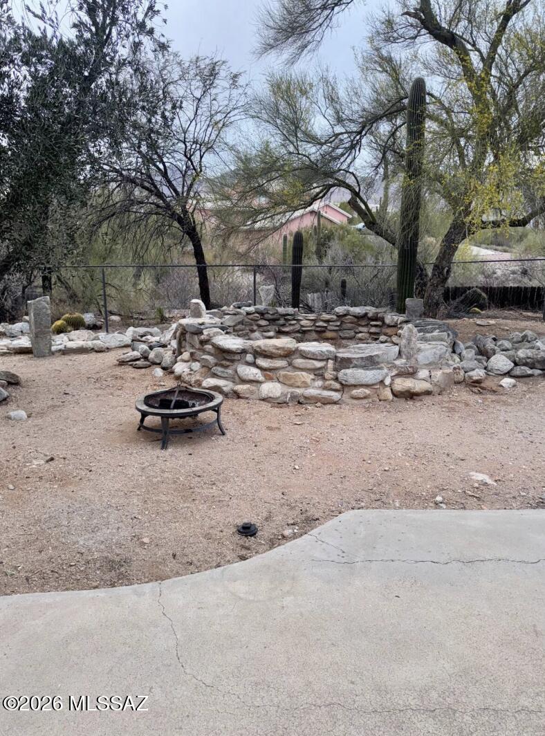 4415 North Swan Road Tucson, AZ 85718 - Photo 24 of 33 a view of a yard with a tree