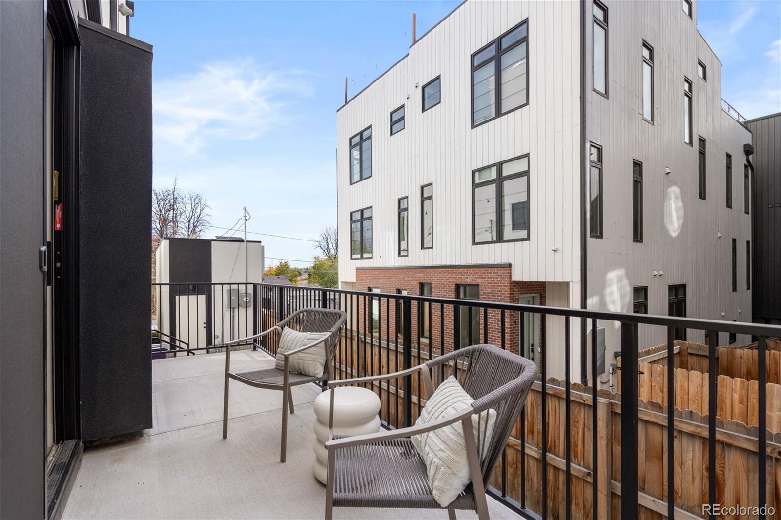 1256 Yates Street Denver, CO 80204 - Photo 13 of 26 a view of a chair and table in the balcony