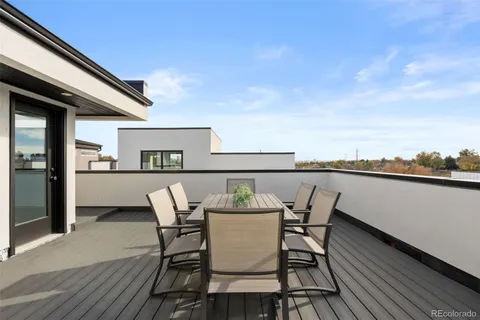 a view of a terrace with seating space