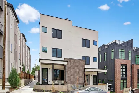 a front view of a multi story residential apartment building