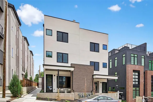 a front view of a multi story residential apartment building