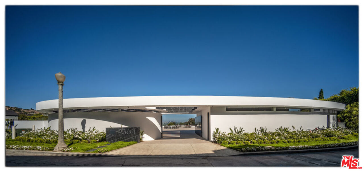 9364 Beverlycrest Drive Beverly Hills, CA 90210 - Photo 4 of 18 a picture of a table with a wooden floor