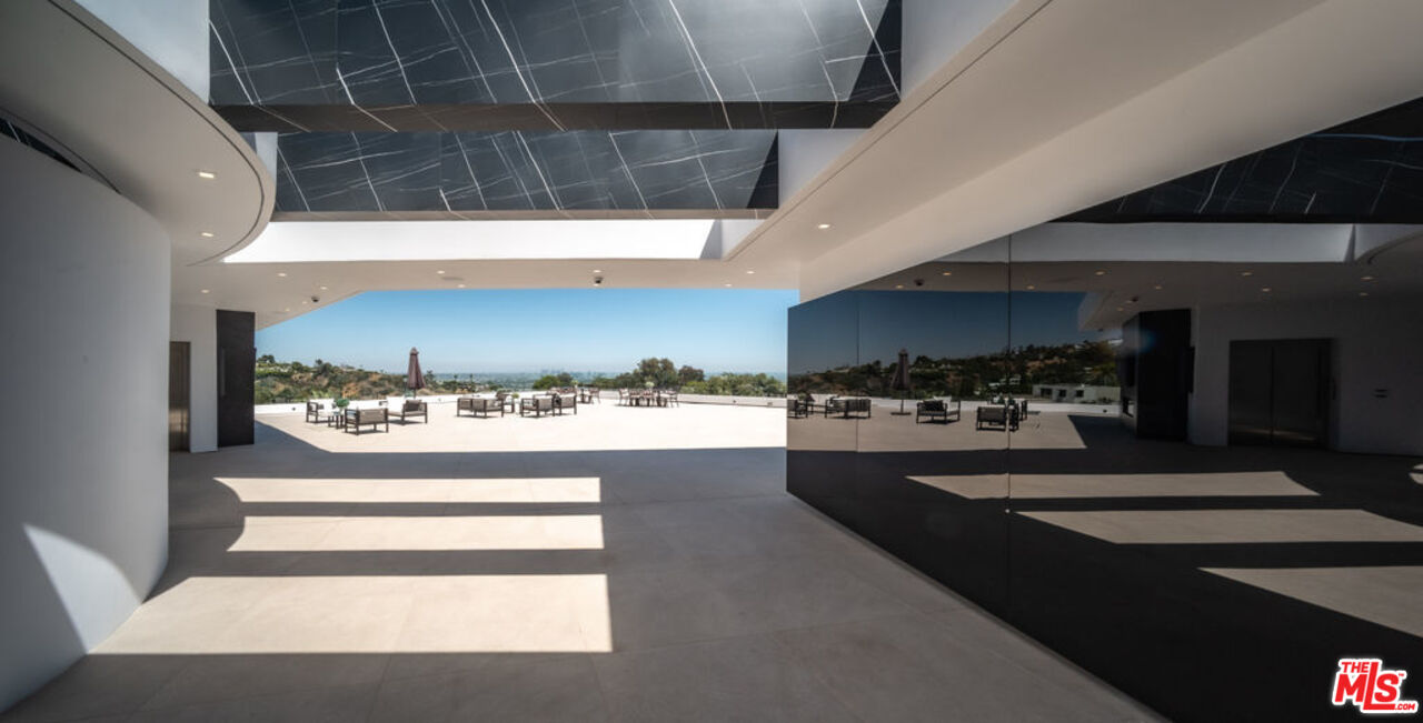 9364 Beverlycrest Drive Beverly Hills, CA 90210 - Photo 5 of 18 a view of open kitchen with a sink and a stove