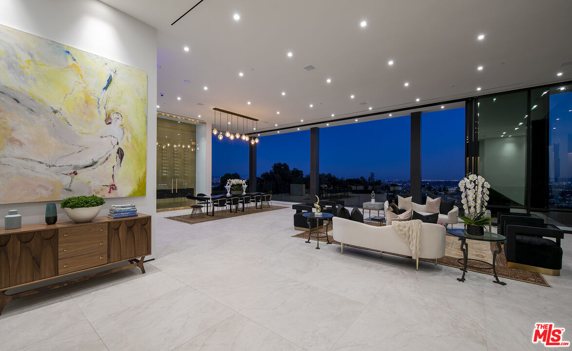 9364 Beverlycrest Drive Beverly Hills, CA 90210 - Photo 9 of 18 a view of a living room with furniture and a flat screen tv