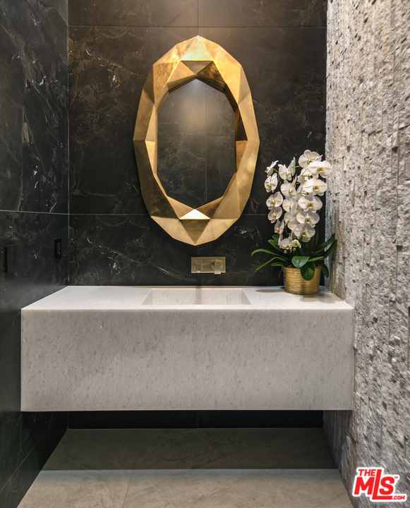 9364 Beverlycrest Drive Beverly Hills, CA 90210 - Photo 10 of 18 a living room with a couch and a table