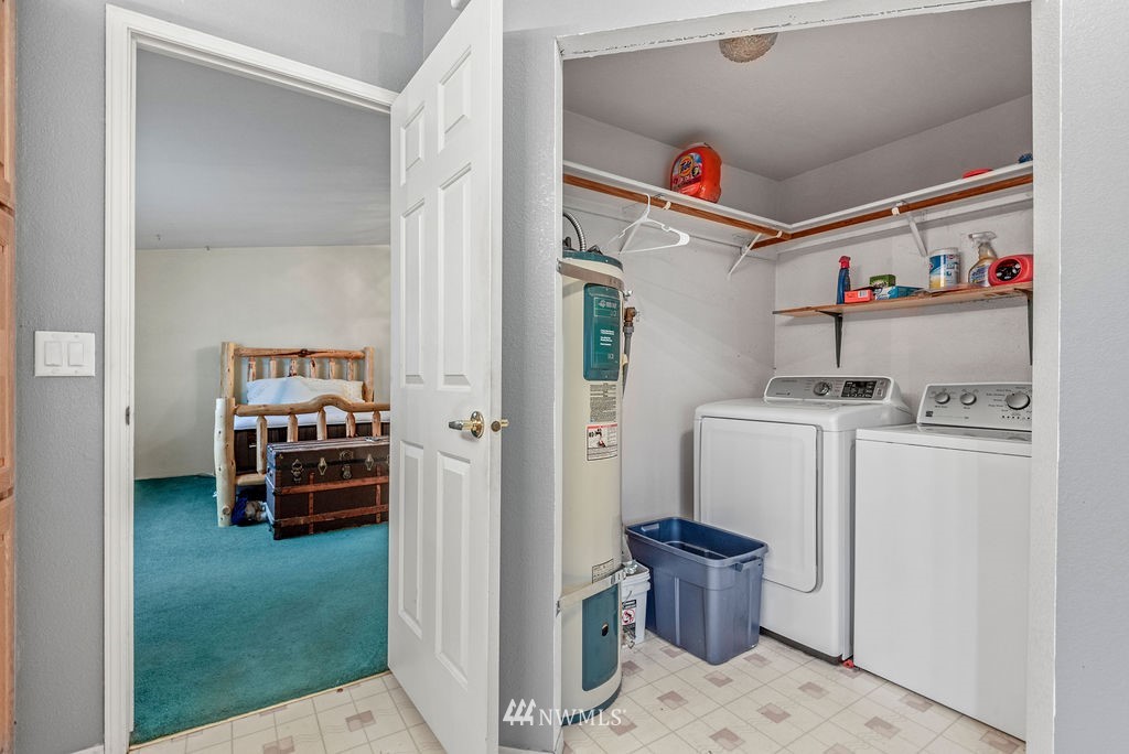 320 Sears Road Winlock, WA 98596 - Photo 15 of 26 a utility room with dryer and washer