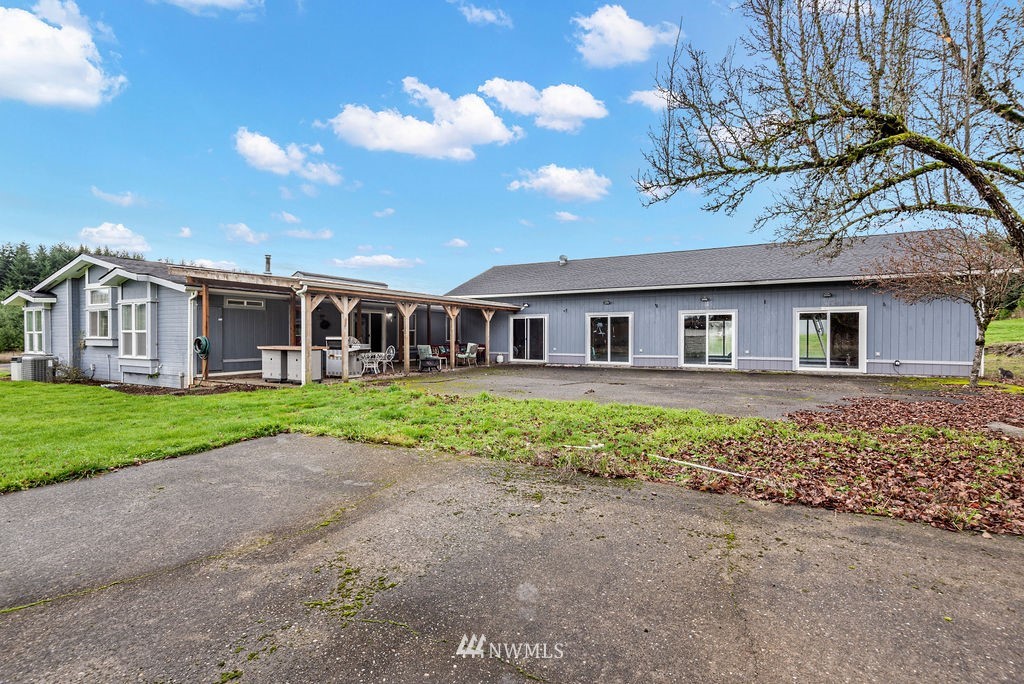 320 Sears Road Winlock, WA 98596 - Photo 22 of 26 a front view of house with yard and green space