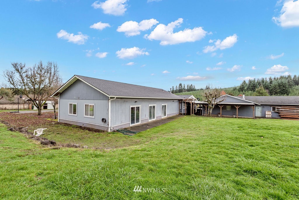 320 Sears Road Winlock, WA 98596 - Photo 23 of 26 a view of a house with a yard