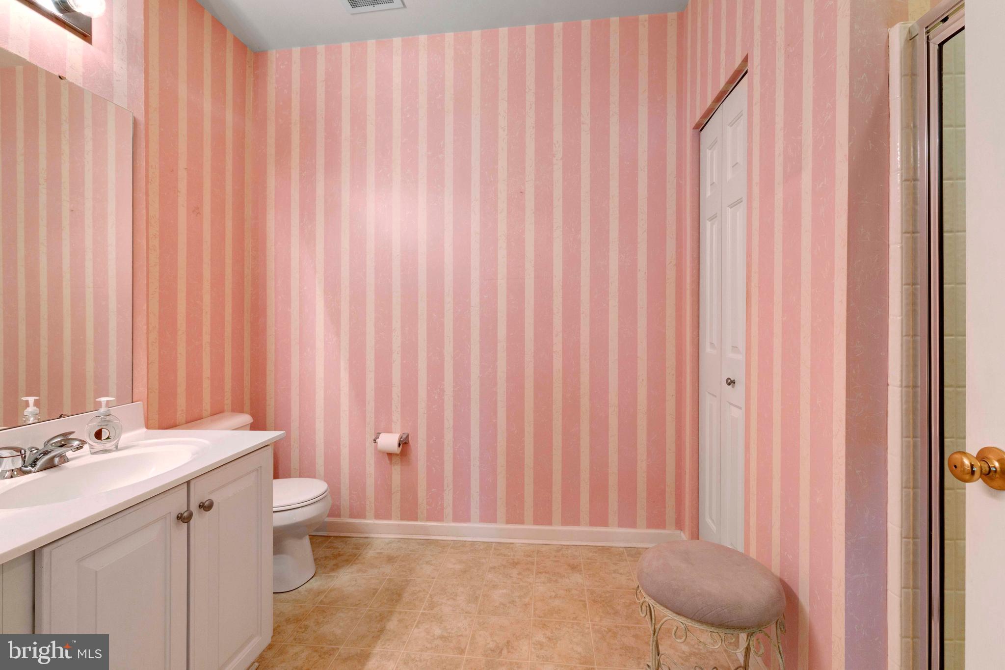 100 Fiddleleaf Lane, Unit 104 Warrington, PA 18976 - Photo 12 of 20 a bathroom with a sink and a toilet