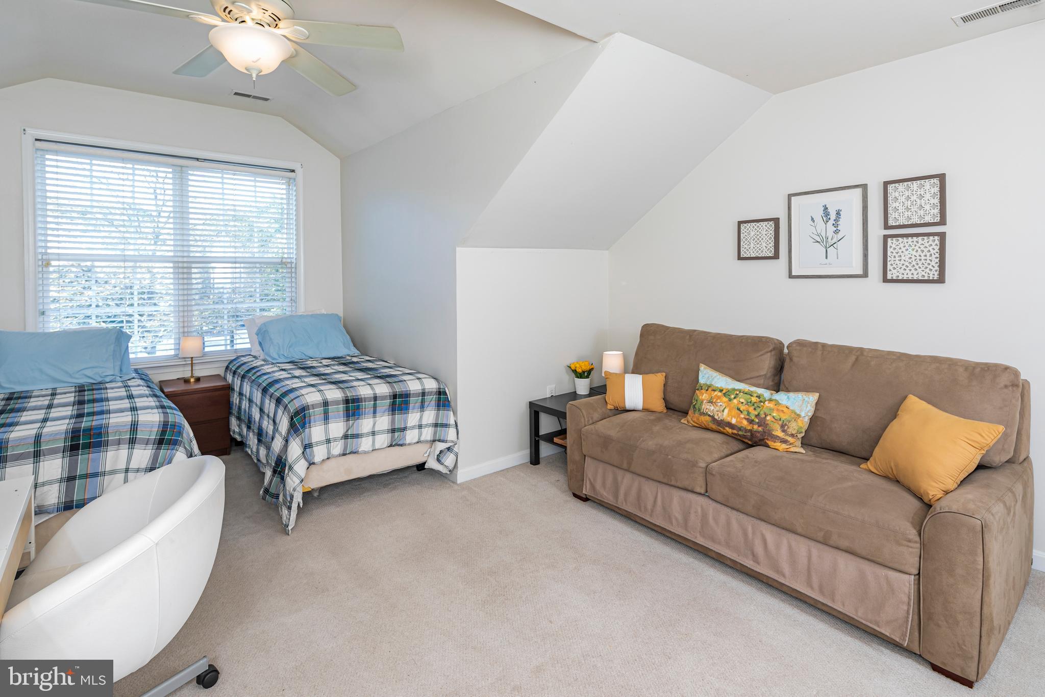 163 Federal Point Boulevard Lawrence Township, NJ 08648 - Photo 24 of 37 a bedroom with furniture and a large window