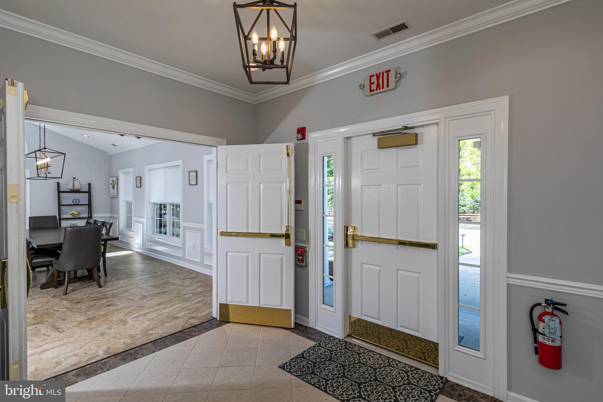 163 Federal Point Boulevard Lawrence Township, NJ 08648 - Photo 29 of 37 a view of a hallway with couch and a living room