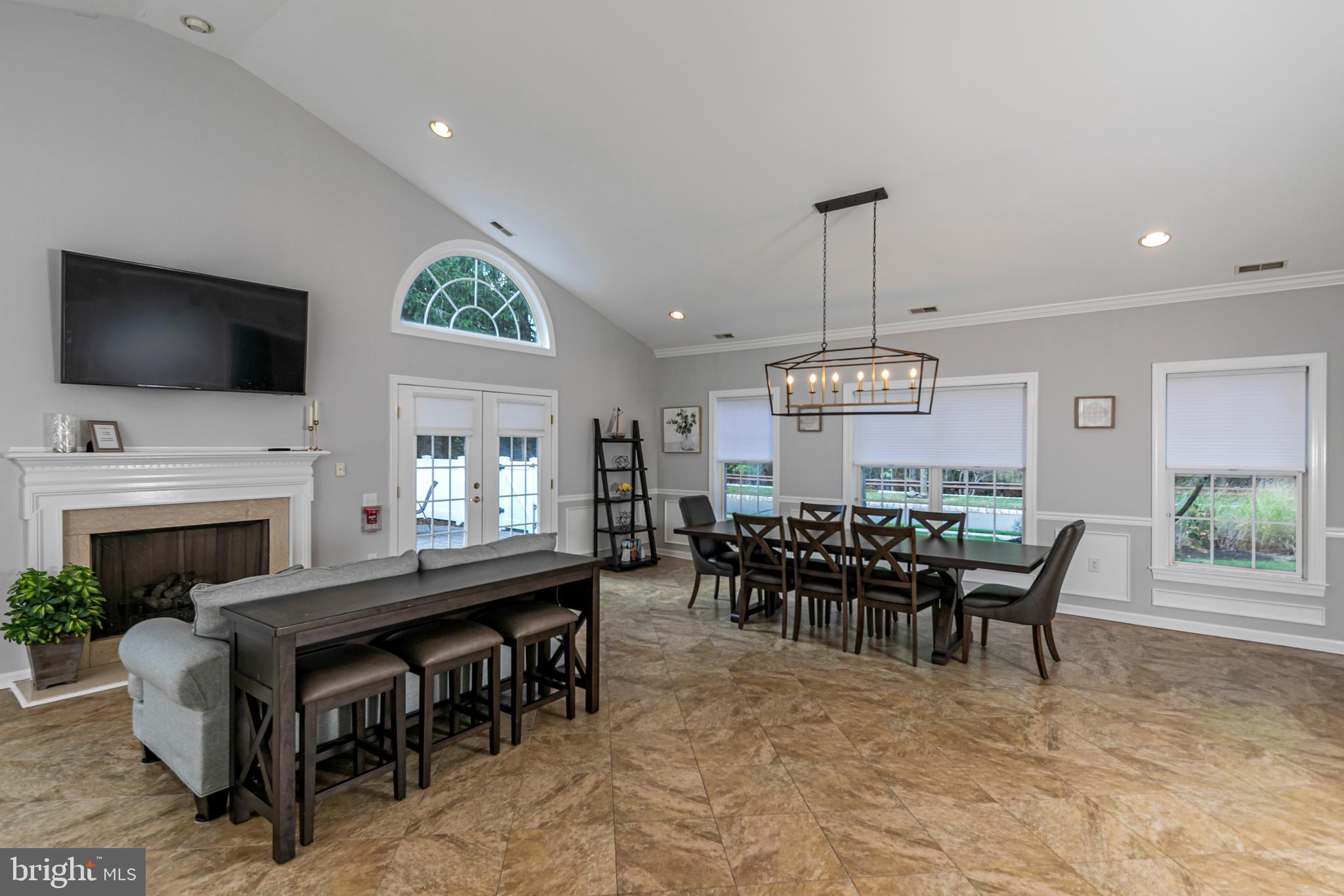 163 Federal Point Boulevard Lawrence Township, NJ 08648 - Photo 35 of 37 a view of a dining room with furniture window and wooden floor