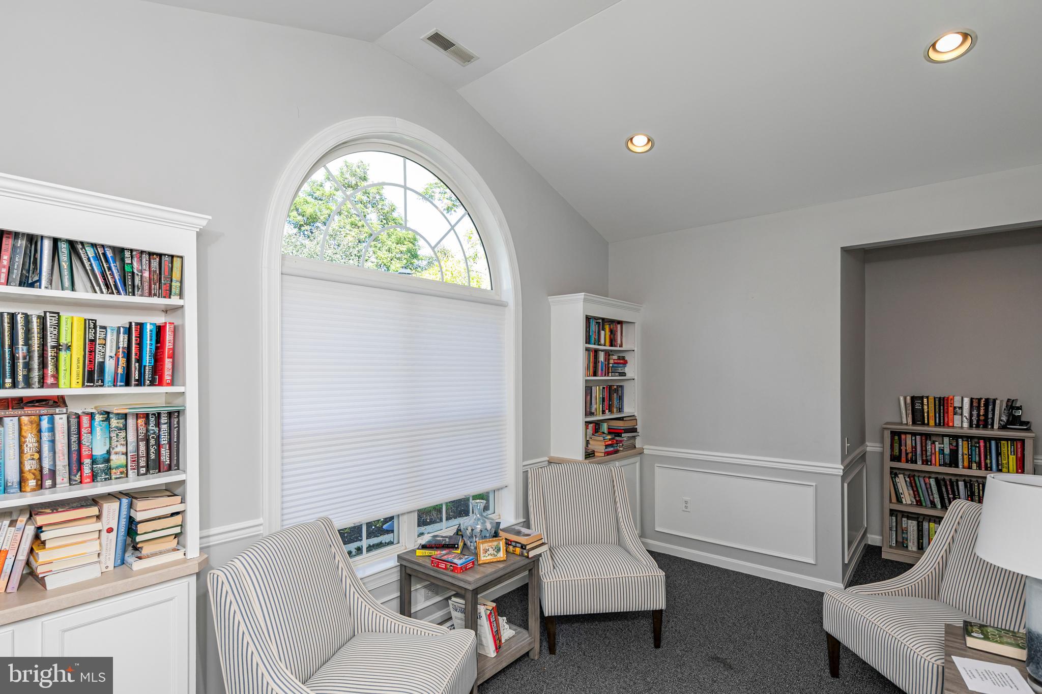 163 Federal Point Boulevard Lawrence Township, NJ 08648 - Photo 36 of 37 a living room with furniture and a book shelf